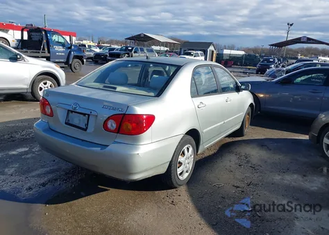 2003 Toyota Corolla Le z USA, uszkodzony, nr VIN JTDBR32E832005254